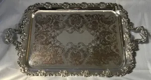 A 19th century ornate Sheffield Plated twin handled serving tray.